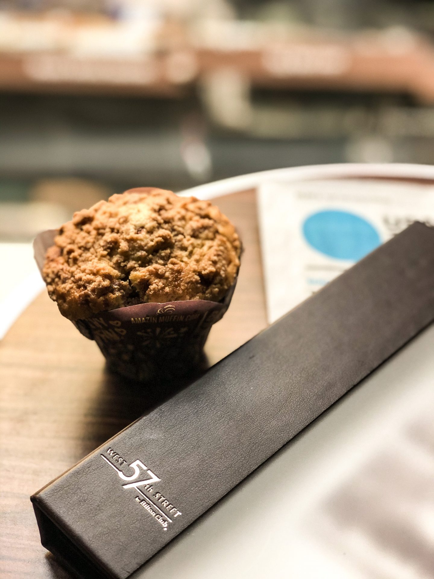 Newspaper and muffin at West on 57th Street | tipping at hotels